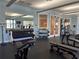 Community gym with weights and fitness equipment at 1244 Romani Ave # 1244, Davenport, FL 33896