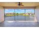 Covered lanai with expansive lake view and fountain at 1244 Romani Ave # 1244, Davenport, FL 33896