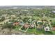 Beautiful aerial view of the property showcasing its prime location in a lush, green neighborhood with stunning views at 12820 Butler Bay Ct, Windermere, FL 34786