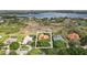 Aerial view of estate home on a landscaped lot, showcasing the spacious surroundings and privacy at 12820 Butler Bay Ct, Windermere, FL 34786