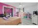 Bright bedroom with toys and dollhouses at 12820 Butler Bay Ct, Windermere, FL 34786