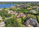 An aerial view of the property shows the layout and surrounding neighborhood near a lake at 12860 Jacob Grace Ct, Windermere, FL 34786