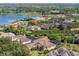 A stunning aerial view of the neighborhood highlights its proximity to the lake at 12860 Jacob Grace Ct, Windermere, FL 34786