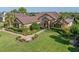 A stately home with beautiful landscaping and a paver driveway creates an amazing first impression at 12860 Jacob Grace Ct, Windermere, FL 34786
