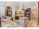 Well-appointed kitchen featuring a center island, modern appliances, and ample counter space at 12860 Jacob Grace Ct, Windermere, FL 34786