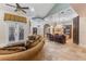 Open-concept home with kitchen and living spaces, lots of natural light, and comfortable seating at 12860 Jacob Grace Ct, Windermere, FL 34786