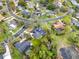 A high angle view of the residences in this neighborhood including pools, mature trees and well kept landscaping at 137 Spring Chase Cir, Altamonte Springs, FL 32714