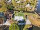 Aerial view showcases the community amenities: sand volleyball, sports field, building, and access to the lake at 137 Spring Chase Cir, Altamonte Springs, FL 32714