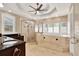 Luxurious bathroom featuring large tub, glass shower, tiled surround, and window shutters at 137 Spring Chase Cir, Altamonte Springs, FL 32714