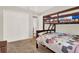 Bedroom featuring a bunk bed, a white closet and a light colored carpet at 137 Spring Chase Cir, Altamonte Springs, FL 32714