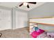 Bedroom featuring a twin-sized bunk bed with carpet flooring and white closet doors at 137 Spring Chase Cir, Altamonte Springs, FL 32714