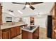 Bright, well-lit kitchen featuring a center island and plenty of counter space and stainless appliances at 137 Spring Chase Cir, Altamonte Springs, FL 32714