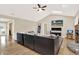 Spacious living room with a vaulted ceiling, skylights, and a cozy fireplace at 137 Spring Chase Cir, Altamonte Springs, FL 32714