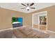 Living room featuring tiled floors, a ceiling fan, and an open view to the dining room at 137 Spring Chase Cir, Altamonte Springs, FL 32714