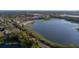 Beautiful aerial view of lakefront community with lush landscaping and serene lake views at 145 N Pearl Lake Cswy # 104, Altamonte Springs, FL 32714