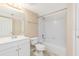 Bathroom featuring a vanity, toilet and shower and bath combination at 145 N Pearl Lake Cswy # 104, Altamonte Springs, FL 32714