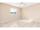 Bedroom with tile flooring, a ceiling fan, and a window view at 145 N Pearl Lake Cswy # 104, Altamonte Springs, FL 32714