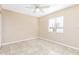 Bedroom featuring tile flooring, ceiling fan and a large window at 145 N Pearl Lake Cswy # 104, Altamonte Springs, FL 32714