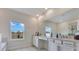 Bright bathroom featuring double sinks, a large mirror, and recessed lighting at 1722 Lake Sims Pkwy, Ocoee, FL 34761