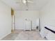 Neutral bedroom featuring light grey bedding, carpeted floors, and a window at 1722 Lake Sims Pkwy, Ocoee, FL 34761