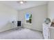 This office or bedroom is bright with a window view and a desk at 1722 Lake Sims Pkwy, Ocoee, FL 34761