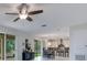 Spacious living room featuring an open layout and easy access to the kitchen at 1722 Lake Sims Pkwy, Ocoee, FL 34761