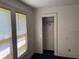 Bedroom featuring a window and a closet at 1803 S Westmoreland Dr, Orlando, FL 32805