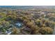 Gorgeous neighborhood aerial view featuring mature trees and a charming home with a pool at 1818 S Oak Ave, Sanford, FL 32771