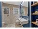 Stylish bathroom featuring modern fixtures, herringbone tile, and a contemporary design at 1818 S Oak Ave, Sanford, FL 32771