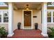 Inviting front entrance featuring a stylish front door and classic brick porch at 1818 S Oak Ave, Sanford, FL 32771