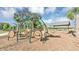 Community playground with various play structures and a shaded picnic area at 1883 Blissful Dr, Kissimmee, FL 34744