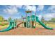 Community playground features slides and climbing structures for children to enjoy at 1883 Blissful Dr, Kissimmee, FL 34744