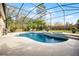 Enclosed pool area with an in-ground pool, spa, and ample seating at 252 Longhirst Loop, Ocoee, FL 34761