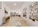 Open-concept dining area with modern decor, pendant lights, and seamless connection to the kitchen at 257 Famagusta Dr, Davenport, FL 33896