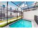 Screened in pool offers privacy and relaxation with clear blue water at 257 Famagusta Dr, Davenport, FL 33896