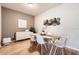 Well-lit dining room featuring modern decor and stylish, white chairs at 2847 Metro Sevilla Dr # 103, Orlando, FL 32835