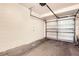 Spacious garage with a white door, ready for parking and storage at 2847 Metro Sevilla Dr # 103, Orlando, FL 32835