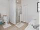 Bright bathroom featuring walk-in shower, soaking tub, toilet, and tile floors at 3726 Mount Hope Loop, Leesburg, FL 34748