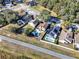 Aerial view of several residential homes each with well maintained yards and in-ground pools at 380 Morning Glory Dr, Lake Mary, FL 32746