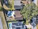 Aerial view of homes with pools and lush greenery at 380 Morning Glory Dr, Lake Mary, FL 32746