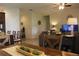 Bright and airy living space features a spacious layout and leads to other areas of the home at 4110 Arlington Ridge Blvd, Leesburg, FL 34748