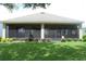 Large screened patio perfect for outdoor entertaining and enjoying the backyard at 4110 Arlington Ridge Blvd, Leesburg, FL 34748