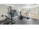 Well-equipped exercise room featuring modern fitness equipment and ample natural light at 4376 Lake Underhill Rd # C, Orlando, FL 32803