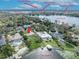 Incredible aerial view with Downtown Orlando and Winter Park in the distance, overlooking Lake Osceola at 443 Lakewood Dr, Winter Park, FL 32789