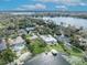 Picturesque aerial shot of luxury homes along Lake Osceola with beautiful landscaping and serene waterfront views at 443 Lakewood Dr, Winter Park, FL 32789