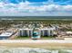 Stunning aerial view of a beachfront condo complex with beach access at 4495 S Atlantic Ave # 5020, Ponce Inlet, FL 32127