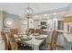 Dining area with seating for six and an open layout to the kitchen at 4495 S Atlantic Ave # 5020, Ponce Inlet, FL 32127