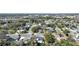 Aerial view of a residential neighborhood with mature trees and well-maintained houses at 48 Carriage Hill Cir, Casselberry, FL 32707