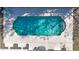 Aerial view shows a beautifully maintained in-ground swimming pool with plenty of surrounding concrete at 48 Carriage Hill Cir, Casselberry, FL 32707