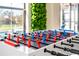 A fun game room featuring a foosball table with colorful players and lush greenery views at 502 Summer Place Loop, Clermont, FL 34714